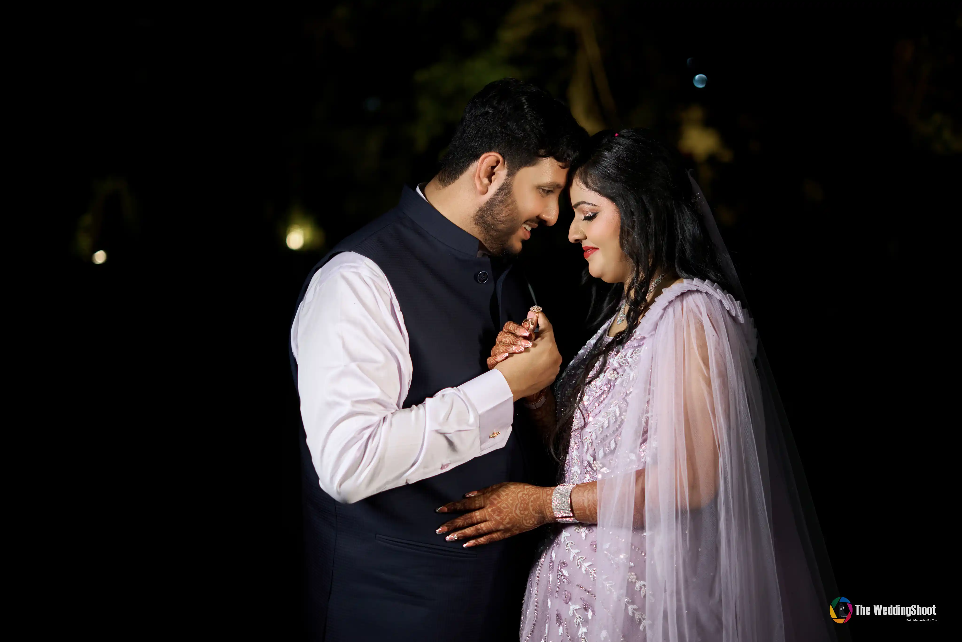Couple engagement portrait on the lawns at The Clarks Varanasi by The WeddingShoot